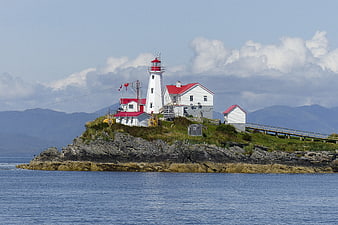 Coastal Lighthouse Station On Rocky Island In British Columbia