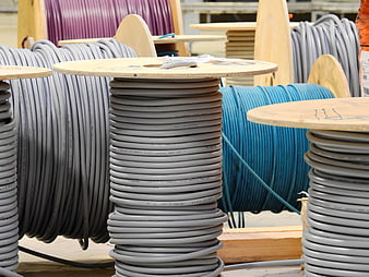 Industrial Cable Spools and Electrical Wires in Warehouse