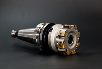 Industrial CNC Face Mill Cutter on Dark Background