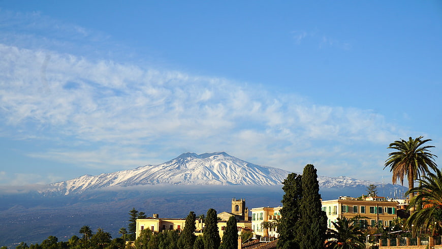 Snow-capped Mount Etna volcano view from Taormina, Sicily