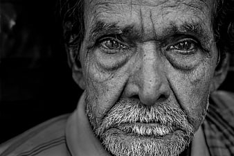 Intense Black and White Portrait of Elderly Man with Weathered Face