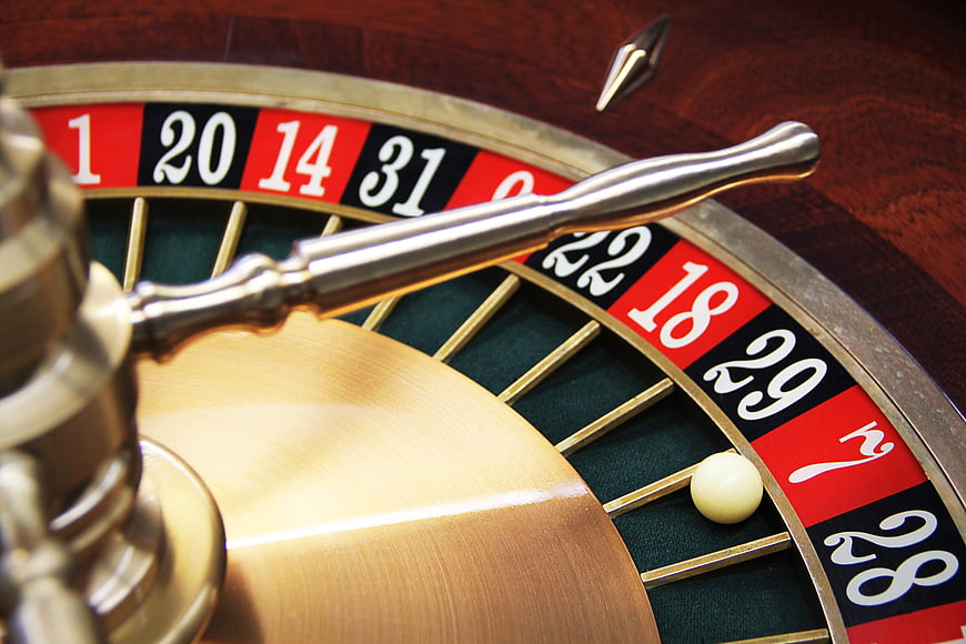 Close-up of a Roulette Wheel with Ball in Casino