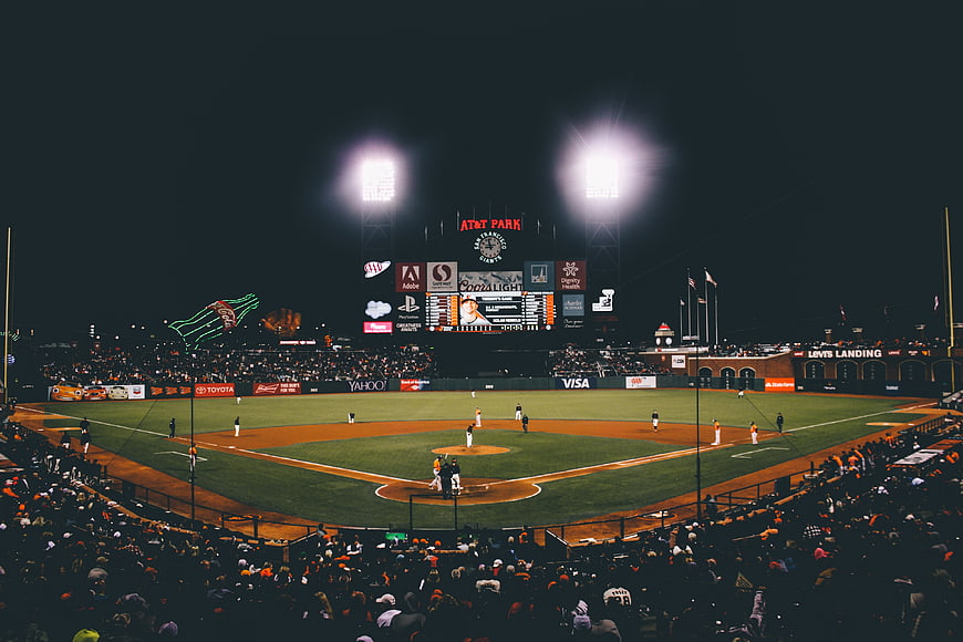 Night baseball game at AT&T Park stadium with crowd