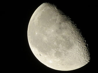 Detailed Crescent Moon Phase Against Black Sky