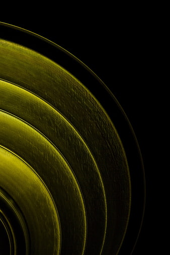 Abstract Golden Concentric Circles on Black Background