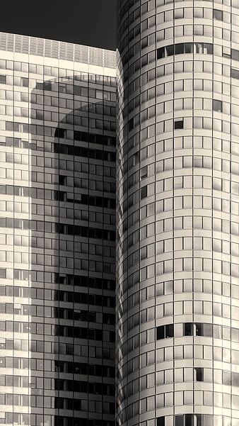 Modern Skyscraper Facade with Geometric Window Patterns