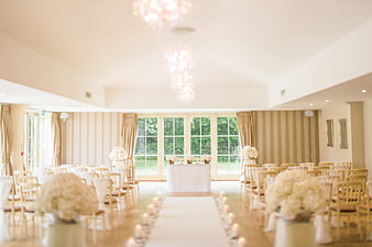 Elegant Wedding Ceremony Hall with White Floral Decor
