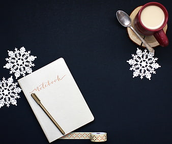 Winter Holiday Flat Lay With Notebook, Pen, Coffee, And Snowflakes