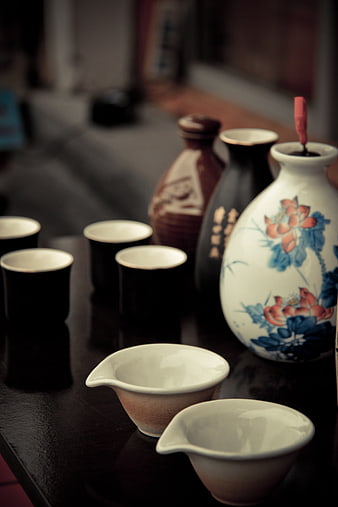 Traditional Chinese Tea Ceremony Set with Ceramic Vases and Cups