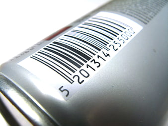 Close-up of barcode on silver product packaging