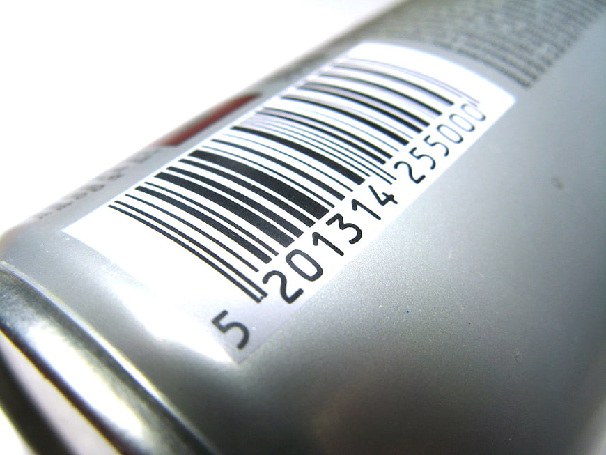 Close-up of barcode on silver product packaging