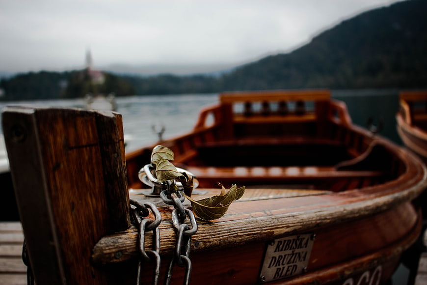 Traditional Wooden Pletna Boat on Lake Bled Shore