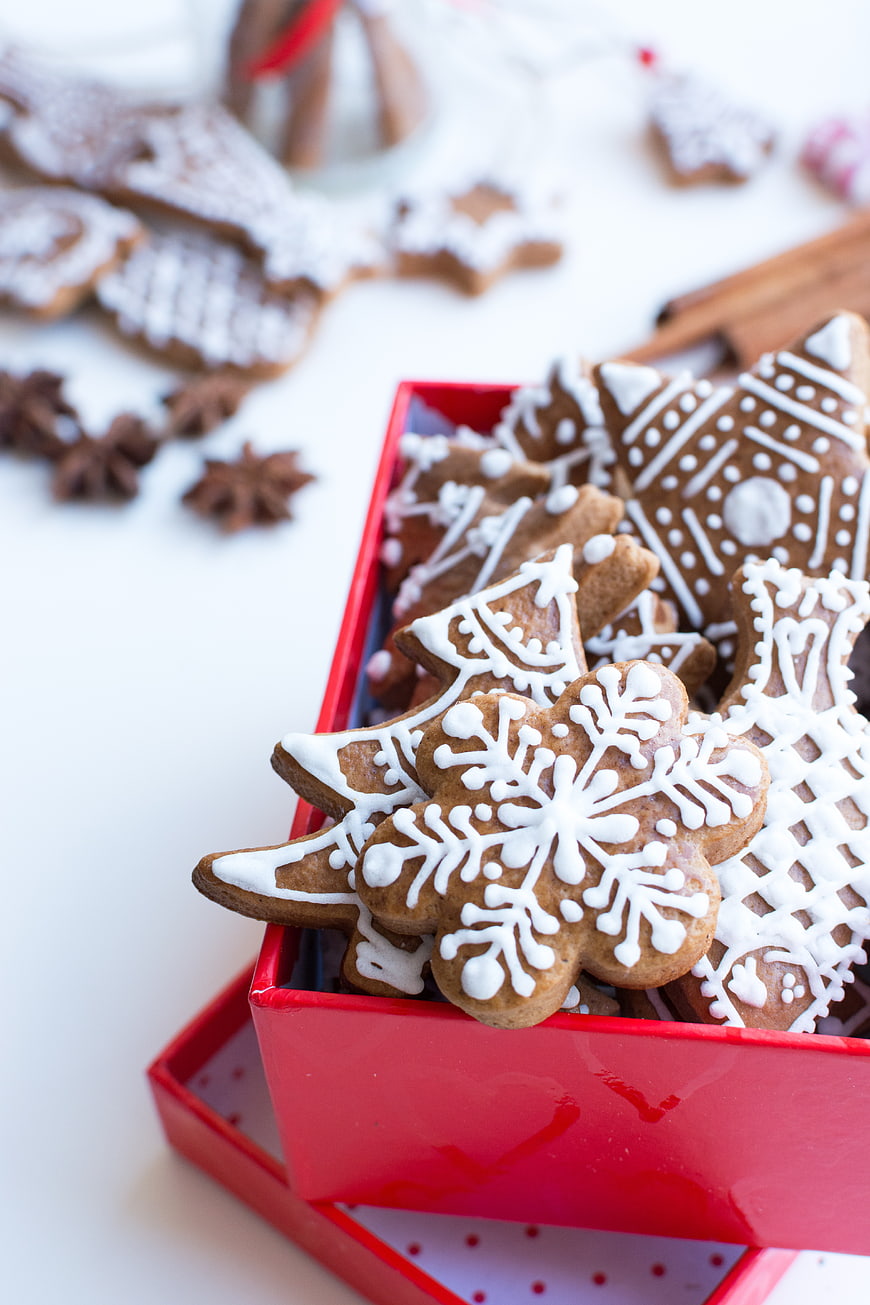Traditional Christmas gingerbread cookies in a red gift box