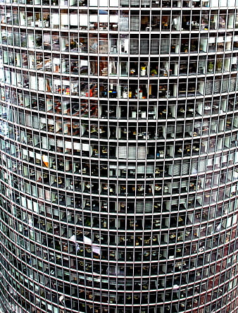 Close-up of curved glass office building facade
