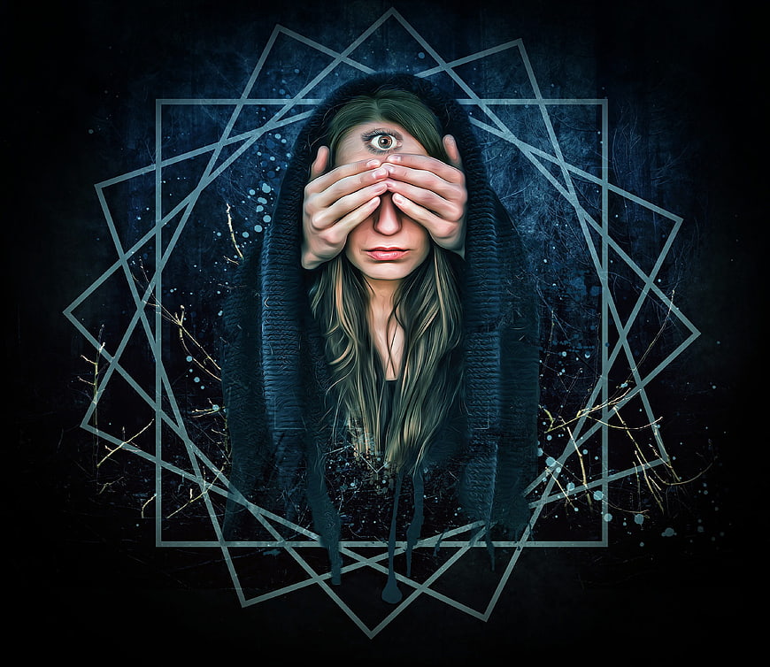 Surreal portrait of woman with third eye and geometric symbols