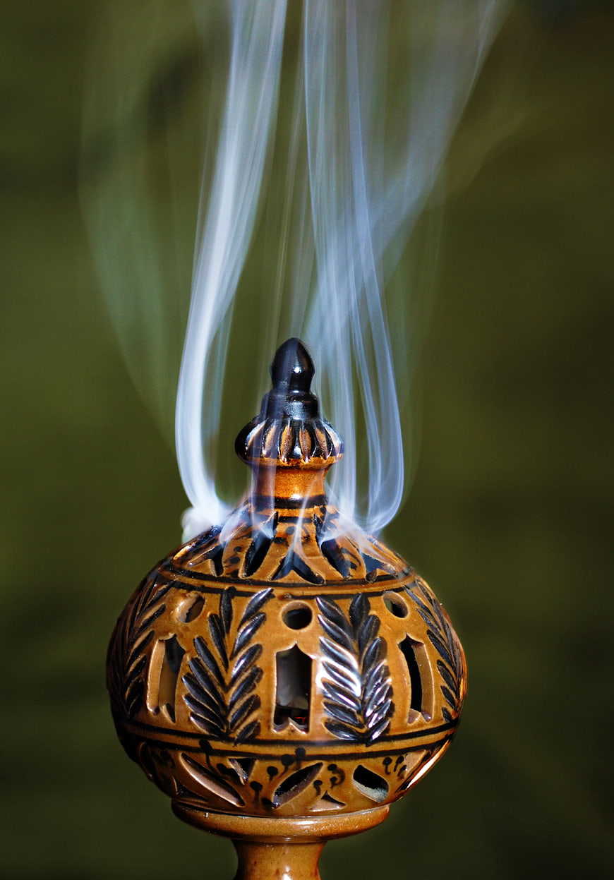Traditional Ceramic Incense Burner with Rising Smoke