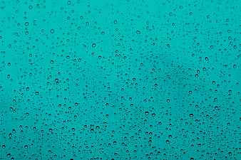 Raindrops on a Teal Background