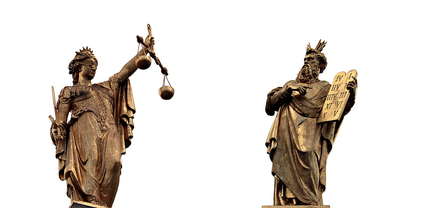 Bronze statues of Lady Justice and Moses with Ten Commandments