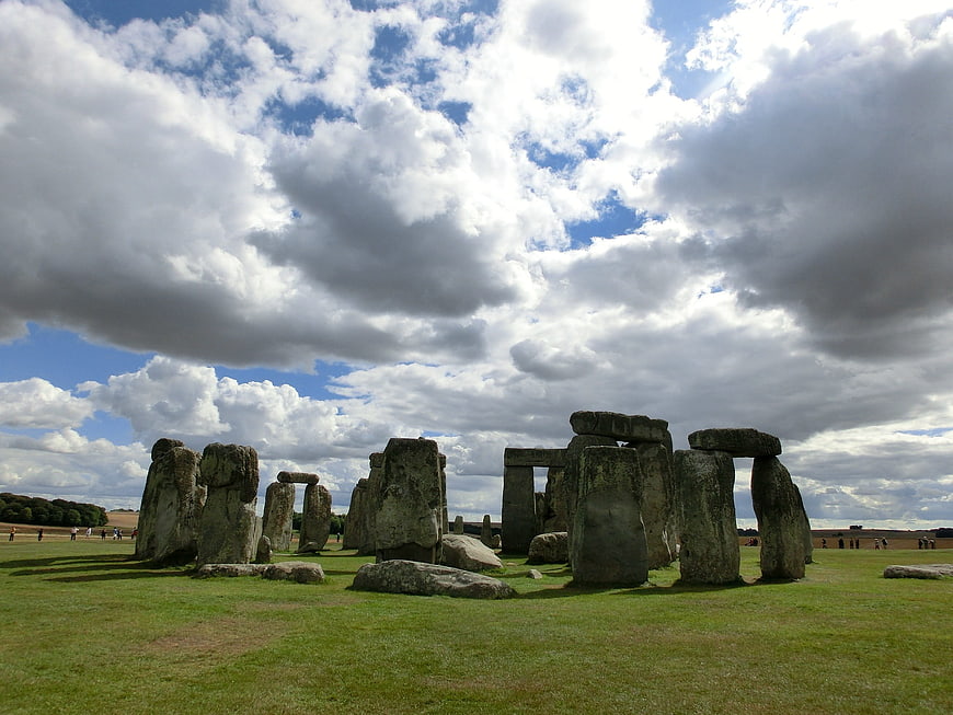 Stonehenge monument under dramatic cloudy sky in England