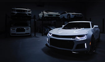 White Chevrolet Camaro in Dark Luxury Car Garage