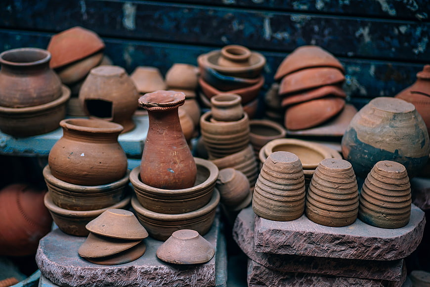Collection of handmade terracotta pottery and clay pots
