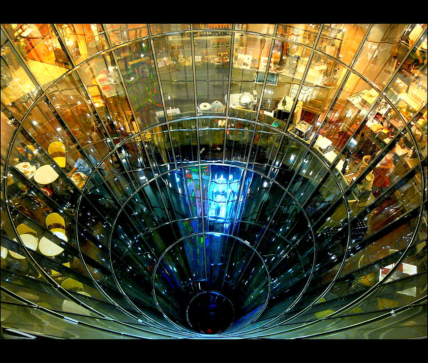 Looking Up At Glass Atrium Architecture In Department Store