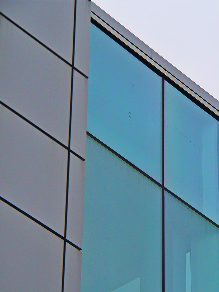 Modern Glass and Concrete Building Facade Detail