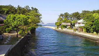 Scenic coastal inlet in Hagi town, Japan with traditional houses
