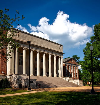 Classical Library Building with Columns and Blue Sky