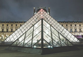 Louvre Pyramid at Night with Eiffel Tower Reflection