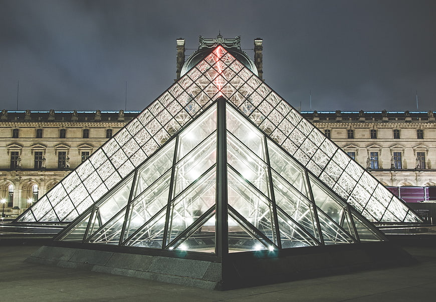 Louvre Pyramid at Night with Eiffel Tower Reflection