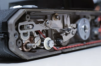 Close-up of vintage camera internal mechanical gears and film advance