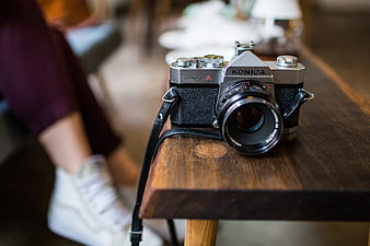 Vintage Konica Autoreflex A Camera on Wooden Table