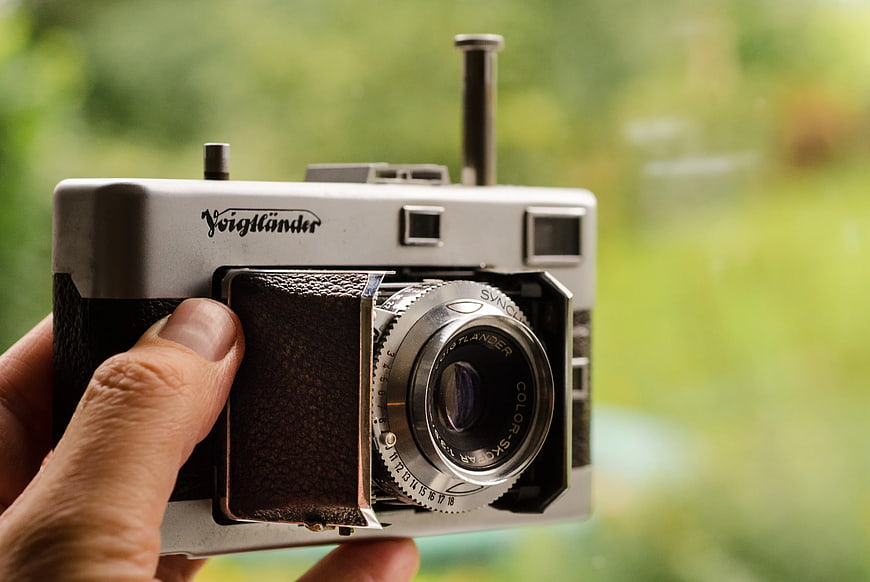 Hand Holding Vintage Voigtländer Film Camera