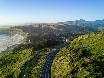 Aerial View of Winding Coastal Highway Along Pacific Coast