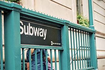 New York City Subway Entrance with Green Gate