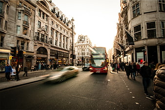 Busy London Street with Red Double-Decker Bus and Pedestrians