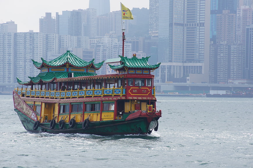 Traditional Chinese Junk Boat Cruising Hong Kong Harbor