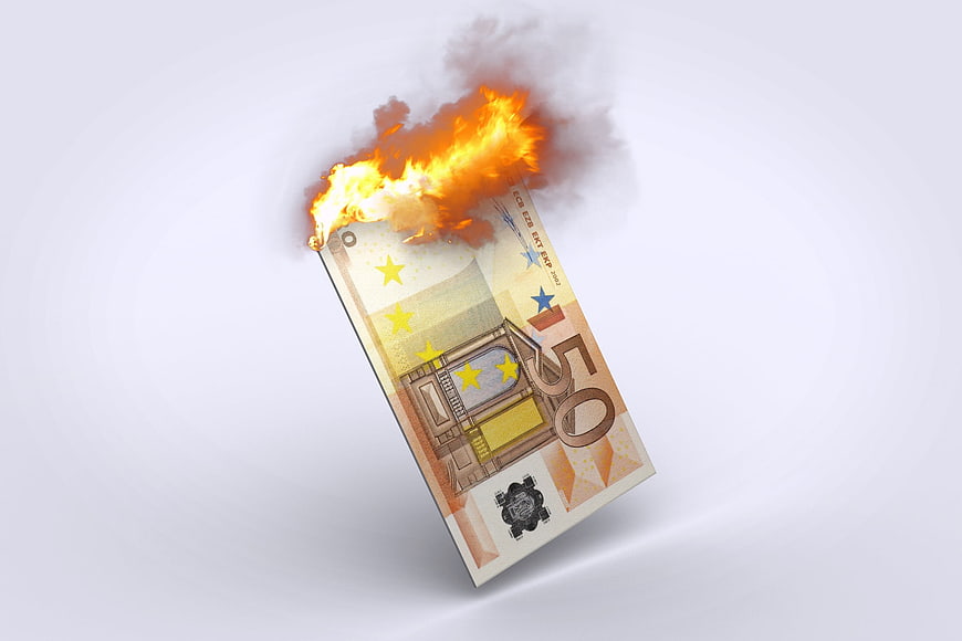 Burning 50 Euro Banknote Concept for Financial Crisis