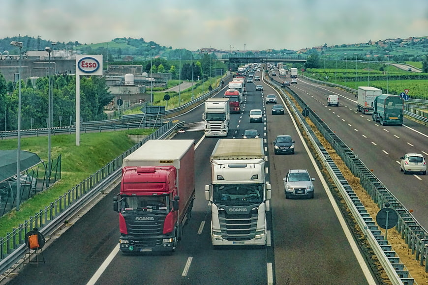 Busy Highway Traffic with Trucks and Cars
