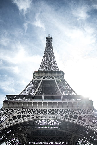 Low Angle View of Eiffel Tower Against Blue Sky