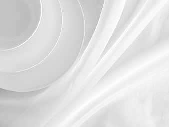 Minimalist White Ceramic Bowl on Flowing Silk Fabric