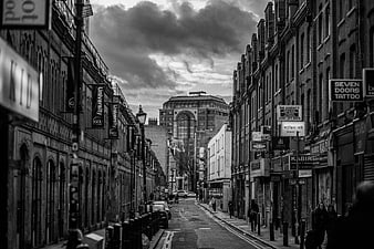 Black and White London Street Scene with Dramatic Sky