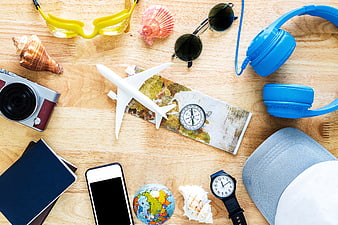 Summer Travel Accessories Flat Lay on Wooden Background