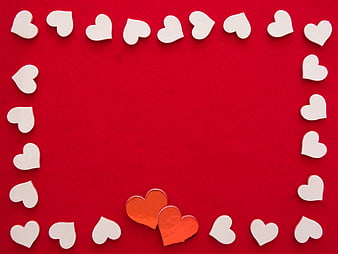 White and Gold Hearts on Red Background with Copy Space