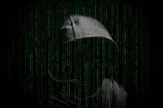 Hacker in Hoodie with Matrix Code Background