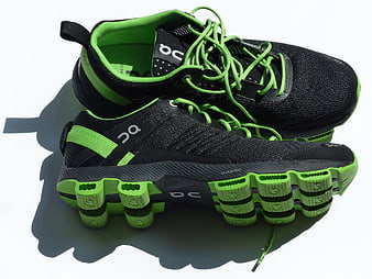 Black and Neon Green Running Shoes on White Background
