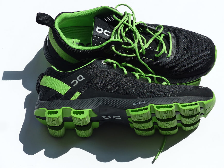 Black and Neon Green Running Shoes on White Background