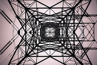 Low angle view of electricity pylon structure against sky