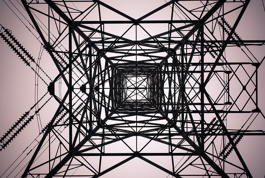 Low angle view of electricity pylon structure against sky